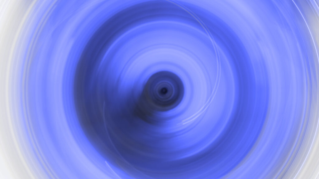 A blue, abstract spiral with lighter edges and a darker center.